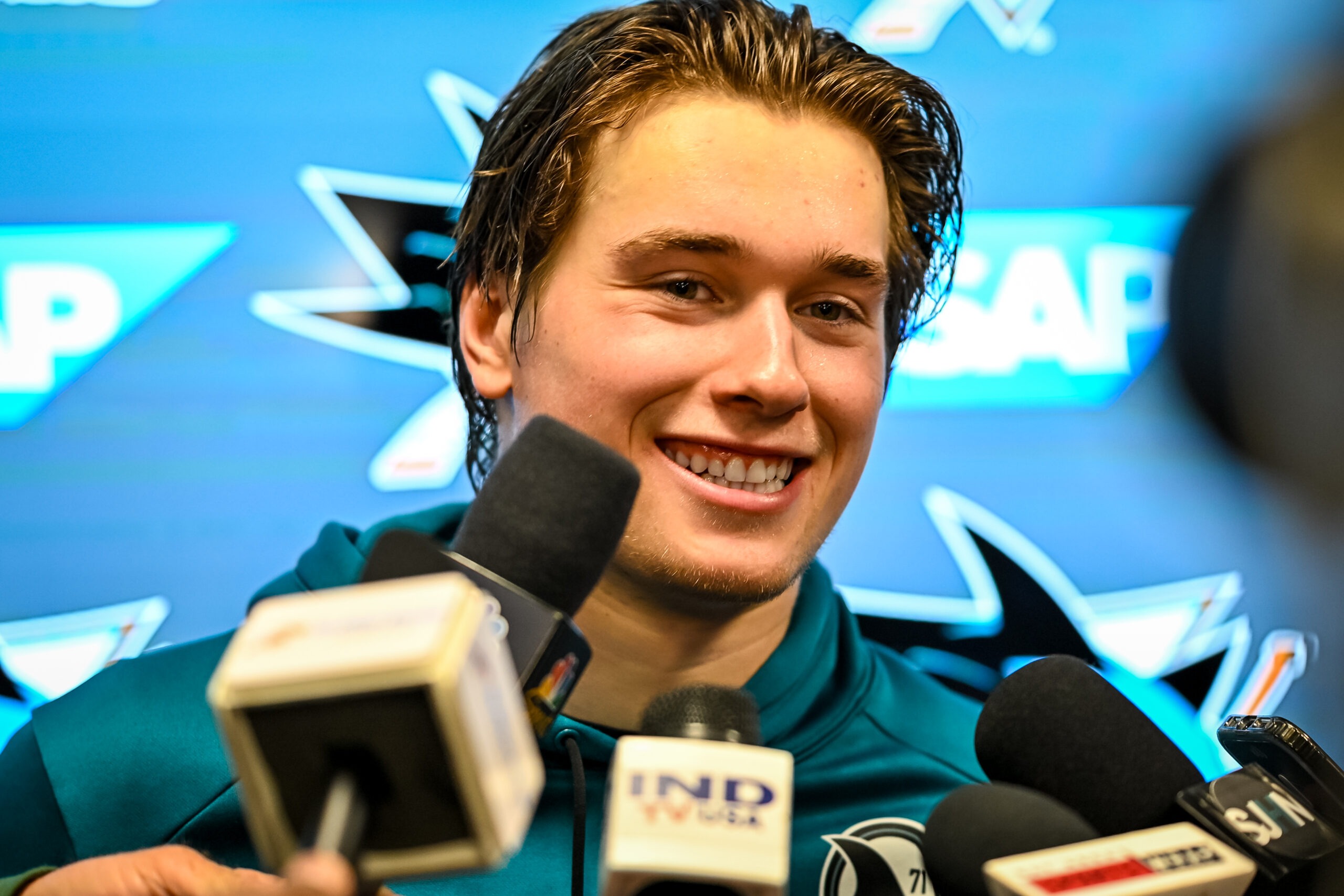 San Jose Sharks center Macklin Celebrini talks to the media postgame.