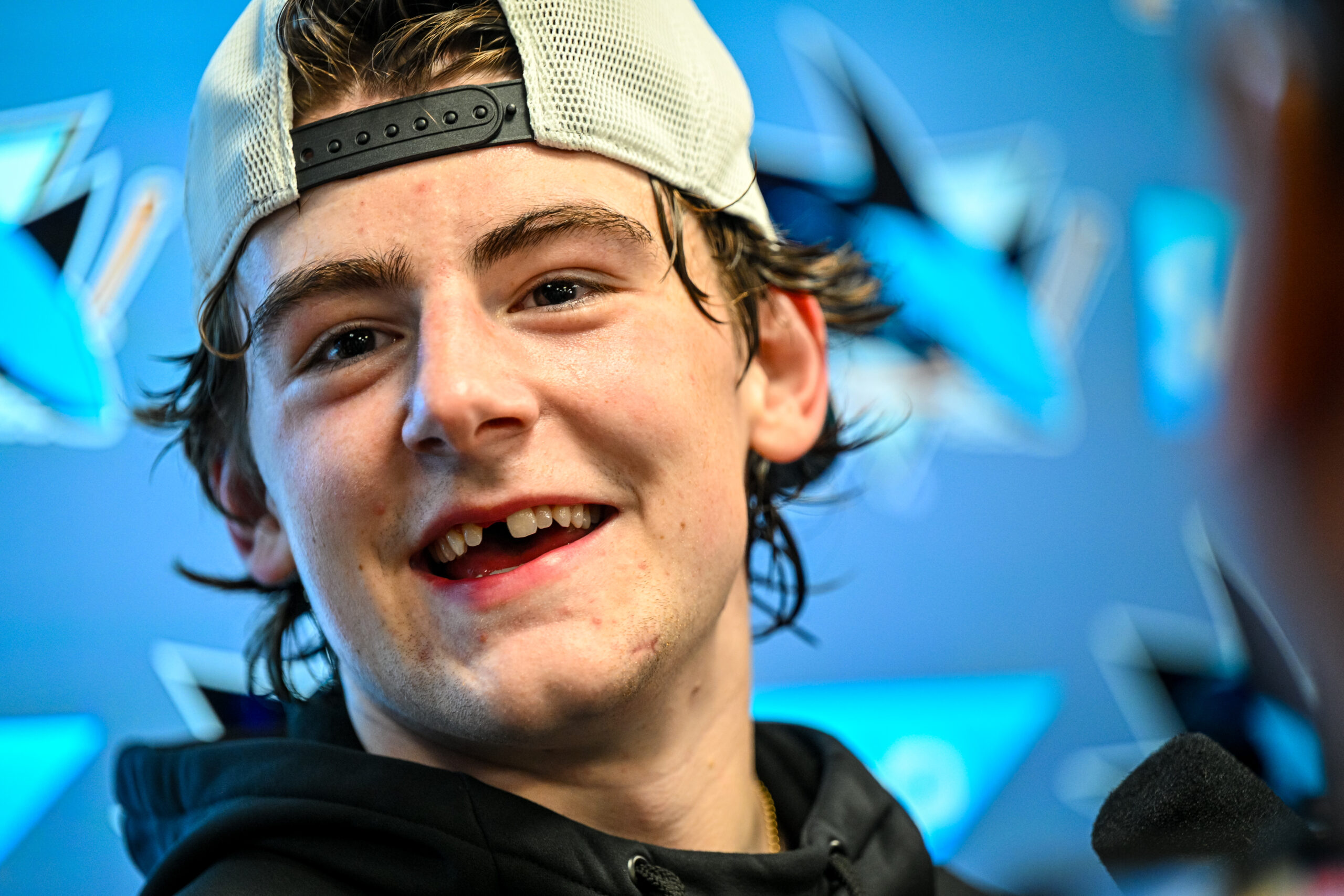 San Jose Sharks defenseman Luca Cagnoni talks to reporters postgame.