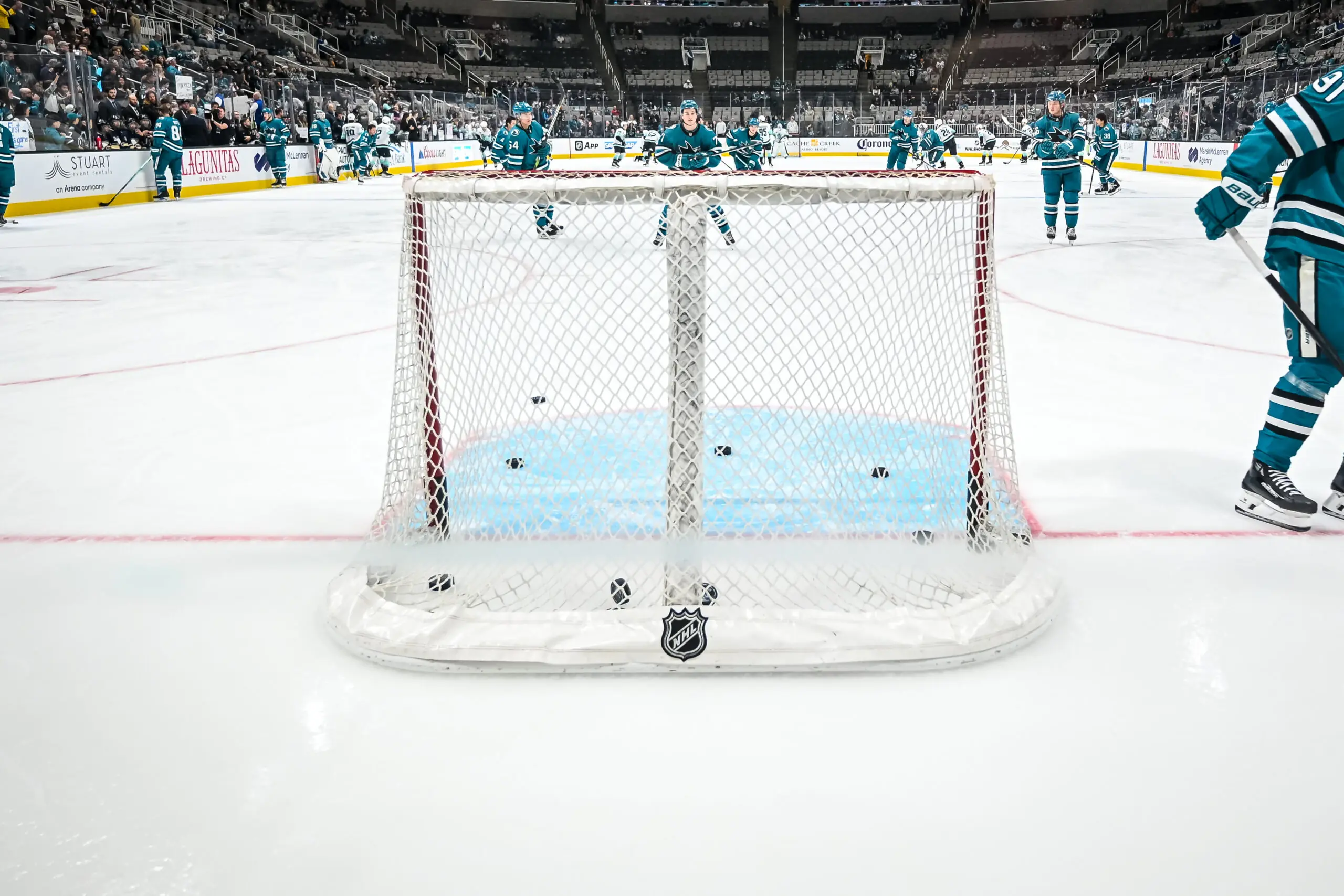 San Jose Sharks participate in warmups before a game against the Seattle Kraken