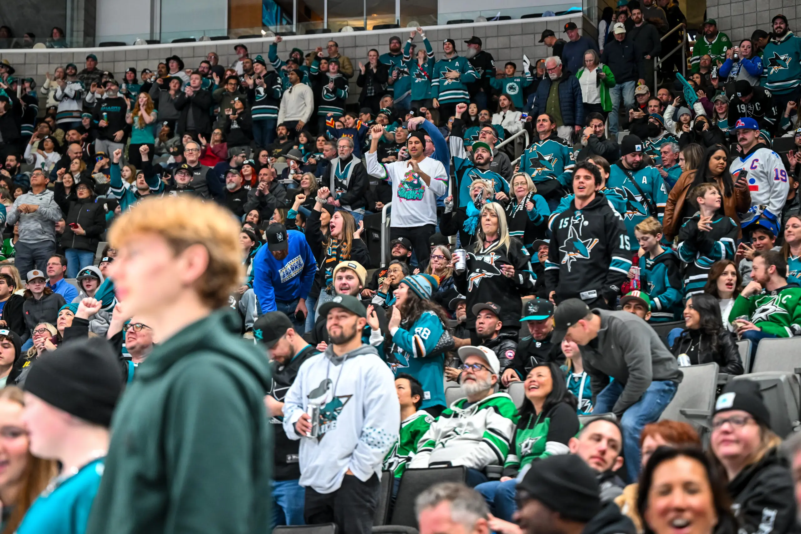 Fans cheer on the San Jose Sharks at the SAP Center.