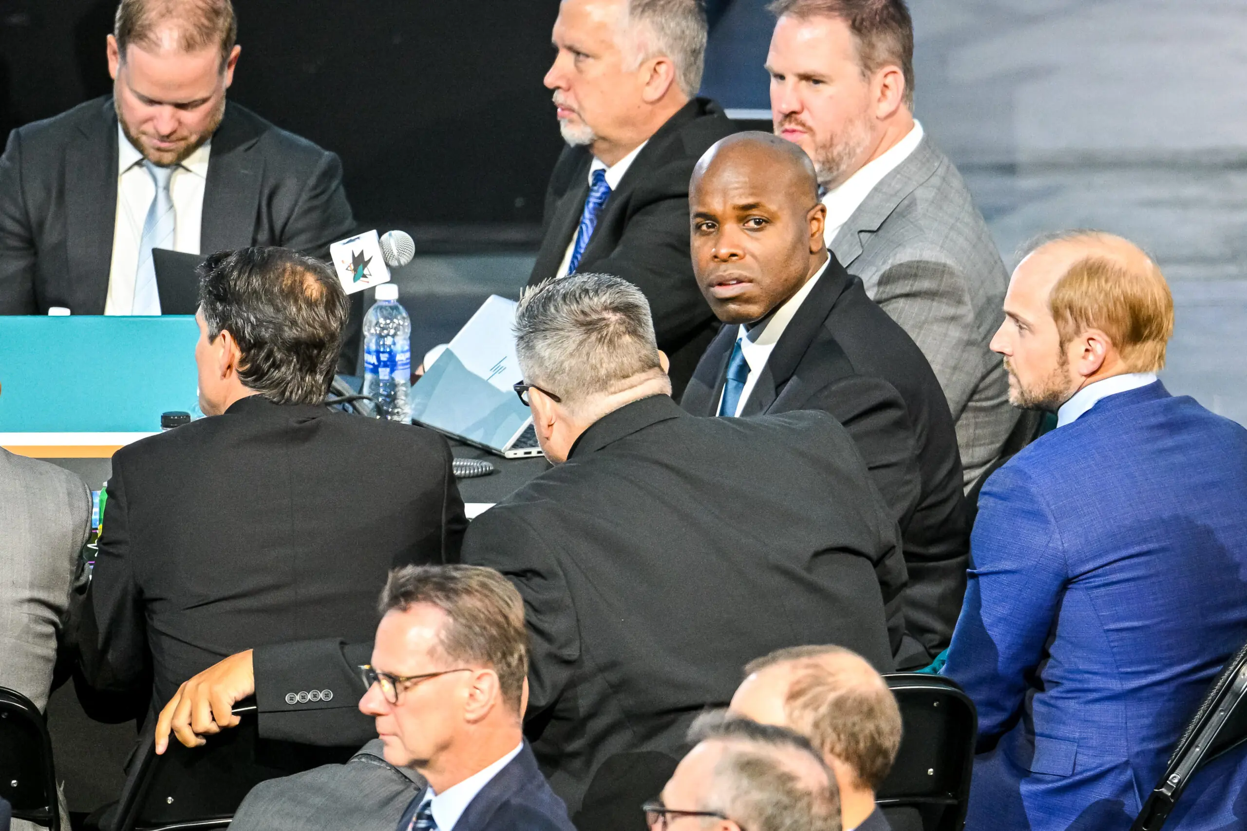 San Jose Sharks GM Mike Grier at the 2024 NHL Draft table.