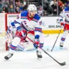 New York Rangers defenseman K'Andre Miller skates against the San Jose Sharks.