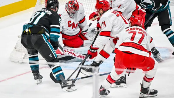 Dimitry Orlov defends against the San Jose Sharks.