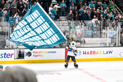 San Jose Sharks Mascott SJ Sharkie celebrating a win.