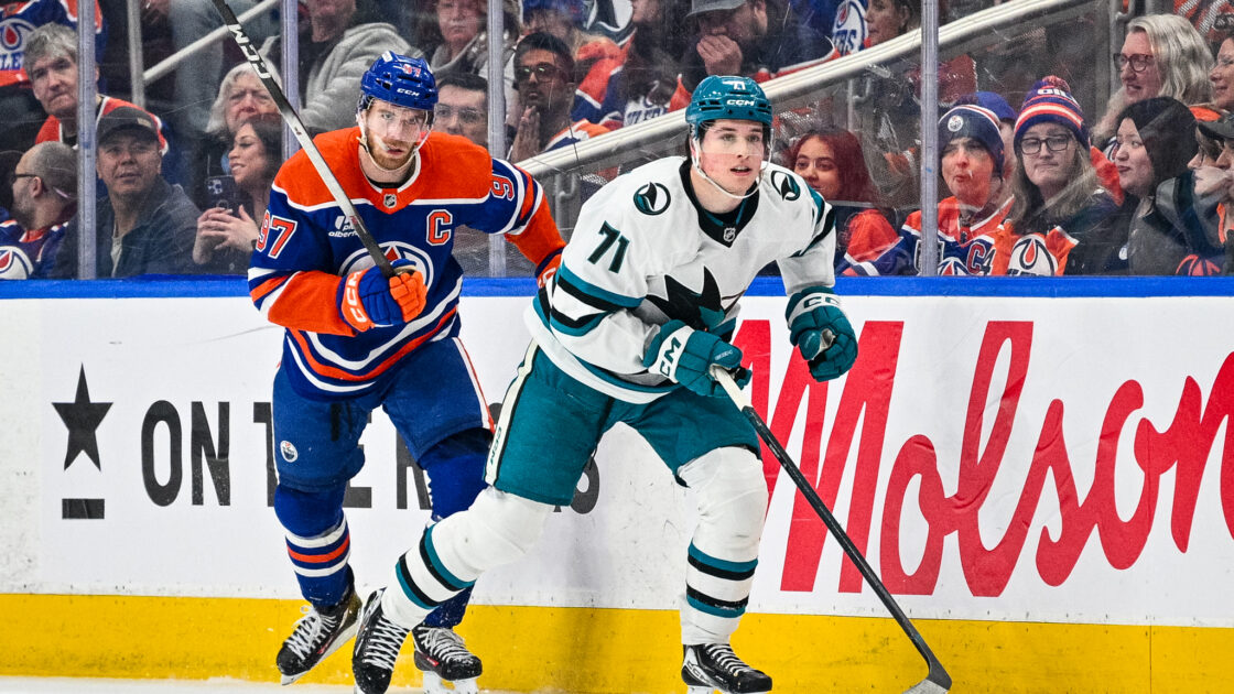 San Jose Sharks forward Macklin Celebrini next to Edmonton Oilers Connor McDavid.