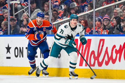 San Jose Sharks forward Macklin Celebrini next to Edmonton Oilers Connor McDavid.