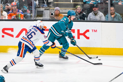 San Jose Sharks defenseman Sam Dickinson and Edmonton Oilers d-man Jake Walman.