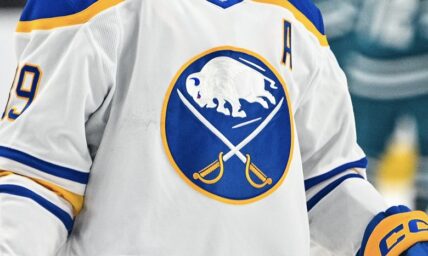 Buffalo Sabres logo against the San Jose Sharks.